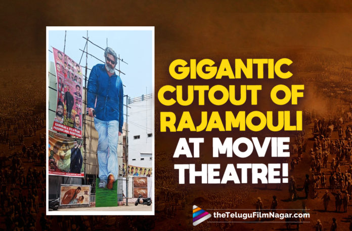Ahead Of RRR Release, Huge Cutout Of Rajamouli At A Hyderabad Theatre,Telugu Filmnagar,Latest Telugu Movies 2022,Telugu Film News 2022,Tollywood Movie Updates,Latest Tollywood Updates, RRR,RRR Movie,RRR Movie Updates,RRR Telugu Movie,RRR Movie Updates,RRR Movie latest Movie Updates,RRR Upcoming Movie,RRR Movie Promotions,RRR latest Promotions Updates,RRR Movie Interviews, RRR: Roudram Ranam Rudhiram Movie,Director SS Rajamouli,Rajamouli Movie RRR,Director SS Rajamouli’s massive cut-out at most popular theatre located at RTC X roads in Hyderabad, SS Rajamouli’s massive cut-out,Theatre management erected a big cutout of Jakkanna outside the theatre,First time theatre Erected such a huge Cutout For Director Rrajamouli, Rajamouli, captain of the movie RRR,SS Rajamouli Cutout,Director SS Rajamouli Huge Cut Outs,SS Rajamouli Cutout at RTC X Road Theaters,Huge Cutout For SS Rjamouli, RRR Movie On 25th march,RRR Movie Grand Release on 25ht March,DVV Entertainments produced the film,MM Keeravani composed the music,RRR is the biggest budget film Industry, RRR Movie promotional campaign,stars Ajay Devgn, Shriya Saran, Ray Stevenson, Alison Doody, and Samuthirakani in vital roles,RRR movie Review,RRR telugu movie Review,RRR First Review,RRR Twitter Review, RRR Movie,RRR Movie Interviews,RRR Movie on March 25th,RRR Movie Promotions,RRR Movie Promotions Event,RRR Movie Review,RRR Movie Songs,RRR Movie First Review,RRR Review,RRR Twitter Reviews,Jr NTR About Malayalam language, RRR Movie Super Hit Songs,RRR Multistarrer Movie,RRR releasing on 25th of this month stars Alia Bhatt and Olivia Morris,RRR Review,RRR Telugu Movie,Rajamouli hailed the creativity of the memers, RRR Telugu Movie Review,SS Rajamouli Multistarrer Movie RRR,Telugu Film News 2022,Telugu Filmnagar,Tollywood Movie Updates,#RRR,#RRRMovie