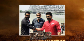The RRR Team Reached The Howrah Bridge And Stole The Show,Telugu Filmnagar,Latest Telugu Movies 2022,Telugu Film News 2022,Tollywood Movie Updates,Latest Tollywood Updates,latest Tollywood Movies, RRR Movie,RRR Movie Team,RRR Telugu Movie,RRR latest Movie,RRR Movie Promotions Updates,RRR movie Latest Promotions updates,RRR Team at Howrah Bridge,RRR Team Reach Howrah Bridge, Ram Charan and Jr NTR starrer RRR: Roudram Ranam Rudhiram, March 22nd, team RRR along with Ram Charan, Jr NTR and SS Rajamouli, reached the Howrah Bridge in Kolkata,West Bengal to meet the fans ahead of RRR‘s release,trio’s signature handshake,picture from the latest RRR promotion event at the Howrah Bridge is going insanely viral on the internet, picture from Howrah Bridge Goes Viral in social Media,RRR Team at Howra Bridge Picture Goes Viral in Social Media,Rise Roar Revolt (RRR) is a fictional tale of the lives of two freedom fighters namely Alluri Sitarama Raju and Komaram Bheem,high budgeted Movie RRR, stars Ajay Devgn, Shriya Saran, Ray Stevenson, Alison Doody, and Samuthirakani in vital roles,RRR Movie On March 25th,RRR Movie Interviews,RRR Movie Releasing on March 25th,RRR Movie Promotions,RRR Movie Promotions Event,RRR Movie Review,RRR Movie Songs,RRR Movie First Review,RRR Review,RRR Twitter Reviews, RRR Movie Super Hit Songs,RRR Multistarrer Movie,RRR releasing on 25th of this month stars Alia Bhatt and Olivia Morris,RRR Review,RRR Telugu Movie,Rajamouli hailed the creativity of the memers, RRR Telugu Movie Review,SS Rajamouli Multistarrer Movie RRR,Telugu Film News 2022,Telugu Filmnagar,Tollywood Movie Updates,#RRR,#NTR,#RRRMovie